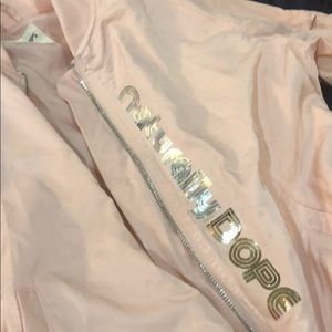 Pink “naturally dope” jacket